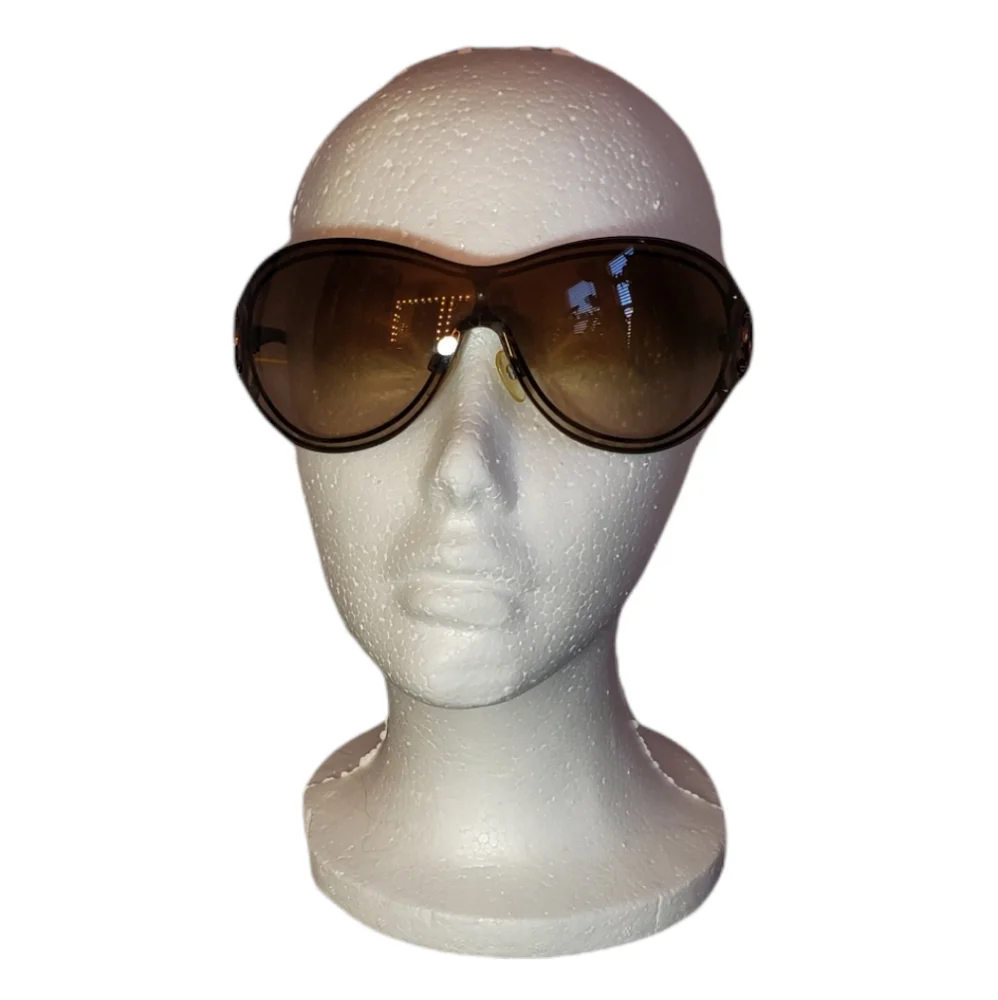 CHANEL Black Frames with Brown Gradient Lenses and Gold CC Accent Sunglasses.